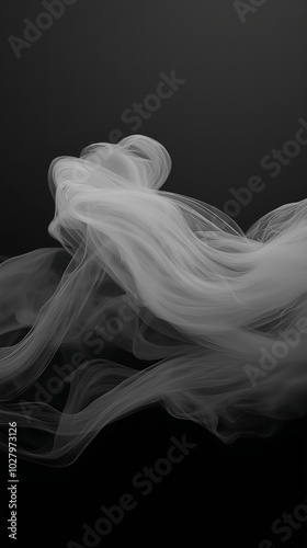 White swirling smoke on dark background