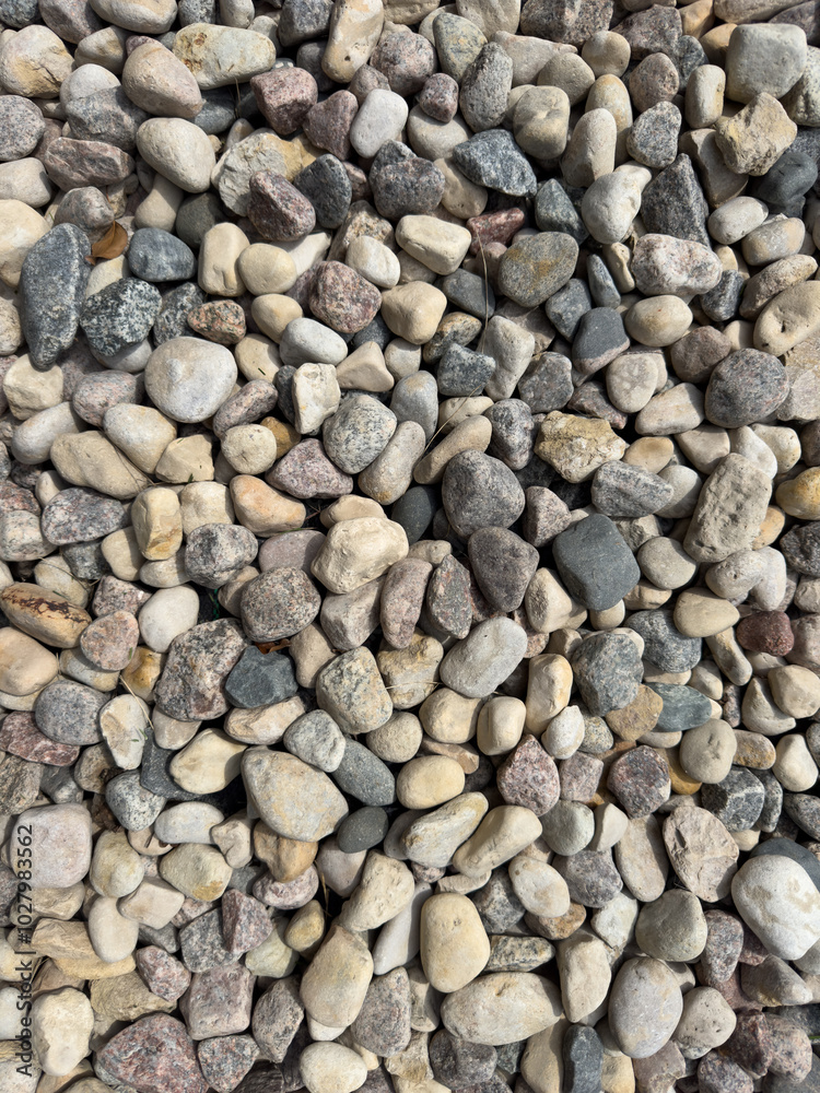 Gravel, granite and pebbles lying on the ground. Granite texture Gravel, granite and pebbles lying on the ground. Granite texture