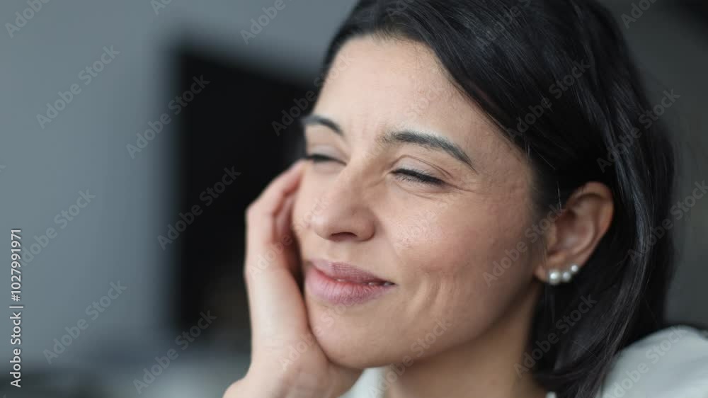 Businesswoman smiling serenely while gazing thoughtfully into the distance Businesswoman smiling serenely while gazing thoughtfully into the distance