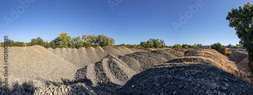 Tableau sur toile Gold mining tailing piles from gold rush panorama