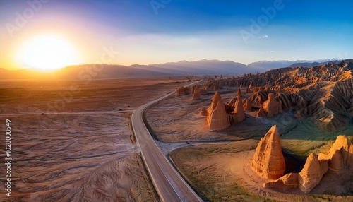 aerial view of spectacular yadan landform and road landscape at sunset the famous dahaidao uninhabited area natural landscape in xinjiang china photo