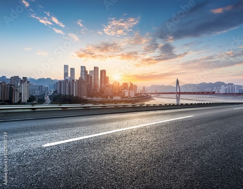 asphalt highway road and mountains with city skyline at sunset in chongqing
