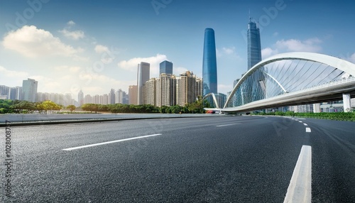 asphalt road and bridge with modern city buildings scenery in guangzhou