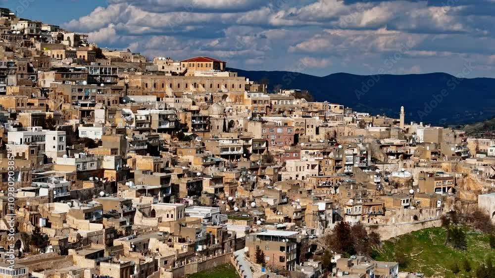 This video of Mardin showcases its historic stone houses, the Ulu Mosque, and Mardin Castle. The city's rich heritage and warm light create a captivating atmosphere for exploration. This video of Mardin showcases its historic stone houses, the Ulu Mosque, and Mardin Castle. The city's rich heritage and warm light create a captivating atmosphere for exploration.