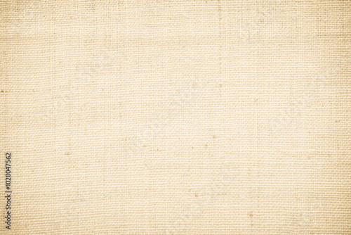 Closeup detail of beige fabric texture background. High resolution photo.