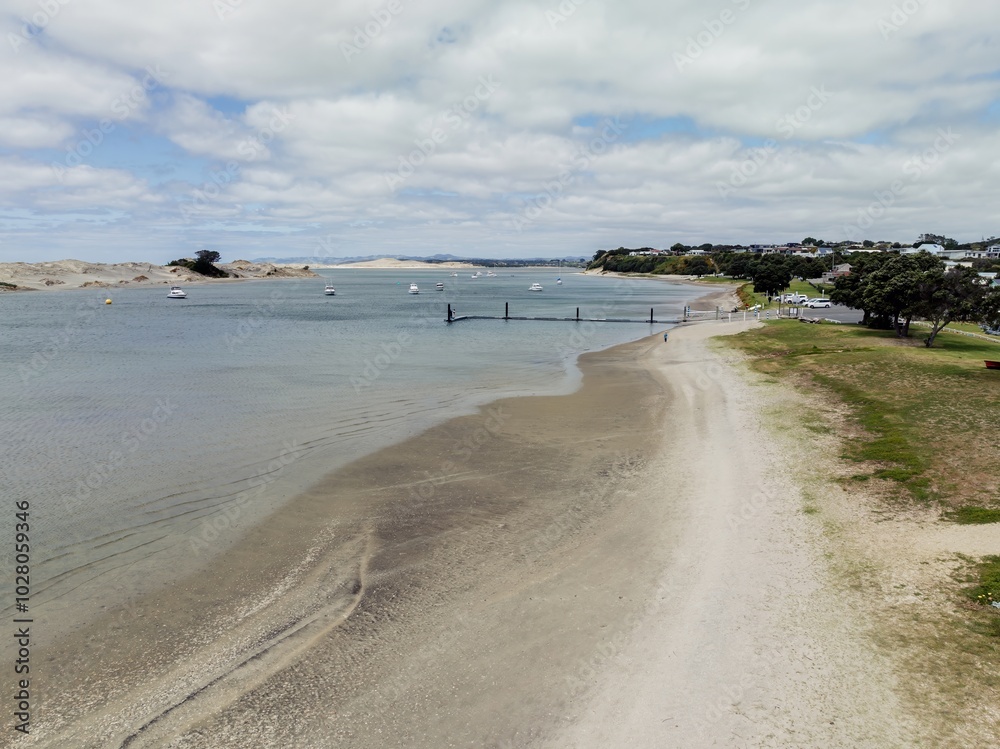 Pier and shoreline of the Mangawhai Harbour, Mangawhai, Northland, New Zealand. Pier and shoreline of the Mangawhai Harbour, Mangawhai, Northland, New Zealand.