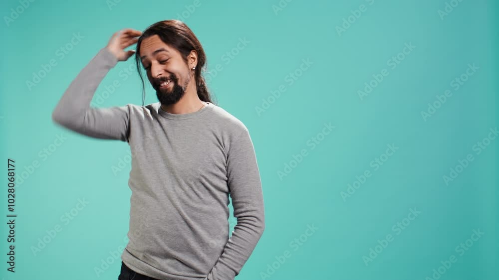 Portrait of shy man putting hand on head, feeling ashamed, isolated over studio shot. Self conscious person feeling insecure while seeing crush, feeling need to express emotions, camera B Portrait of shy man putting hand on head, feeling ashamed, isolated over studio shot. Self conscious person feeling insecure while seeing crush, feeling need to express emotions, camera B