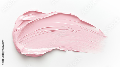 a paint swatch in a soft pink color on a pristine white background