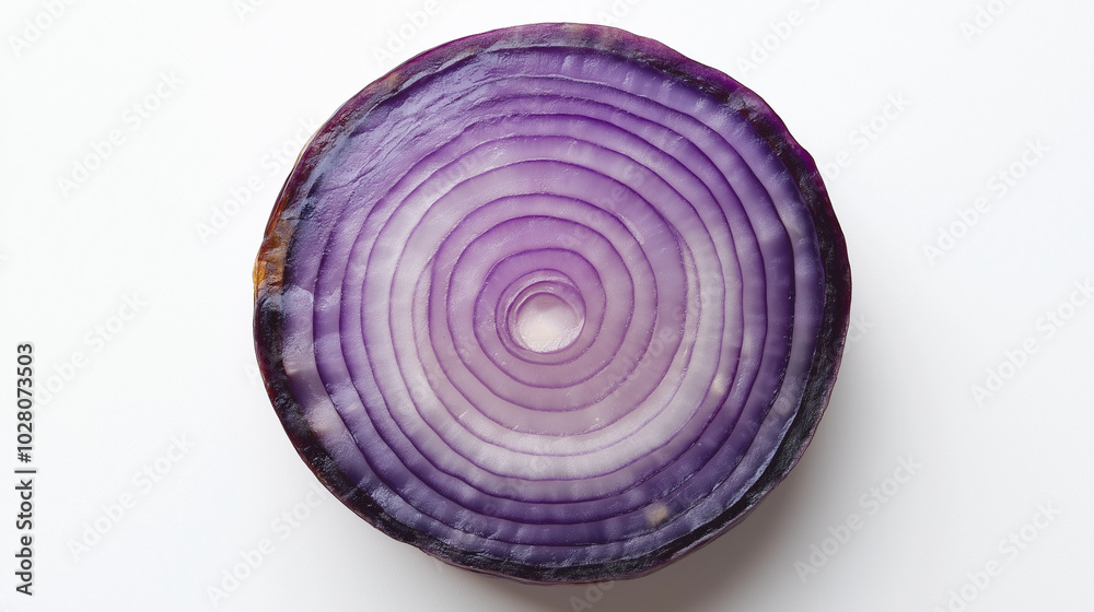 the image is a close-up, top-down view of a single slice of purple onion the image is a close-up, top-down view of a single slice of purple onion