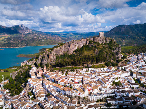 Picturesque scene of whitewashed village Zahara de la Sierra and mountain lake, Spain photo