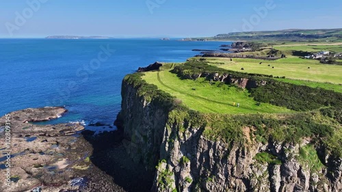 Aerial view of the beautiful and spectacular coastline of Co Antrim on the Atlantic Ocean Northern Ireland photo