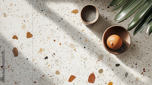 Terrazzo Countertop with Bowls, Orange, and Palm Leaf