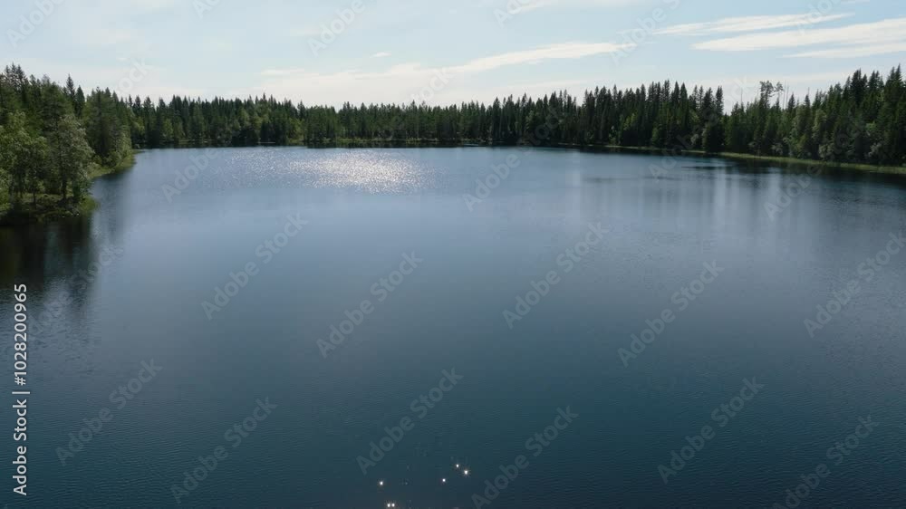 Small lake in Hälsingland Sweden, drone view Small lake in Hälsingland Sweden, drone view
