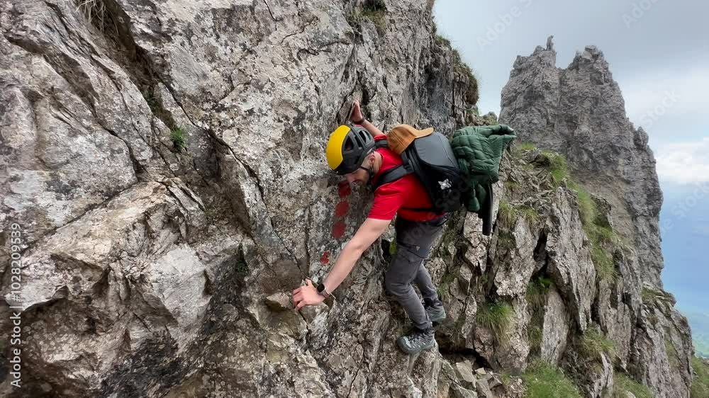 Male Hiker On Rocky And Steepy Slopes Of Grignetta Mountain In Italy - Tracking Shot Male Hiker On Rocky And Steepy Slopes Of Grignetta Mountain In Italy - Tracking Shot