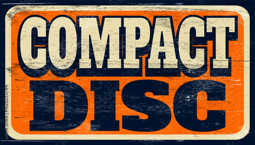 Aged vintage compact disc sign on wood