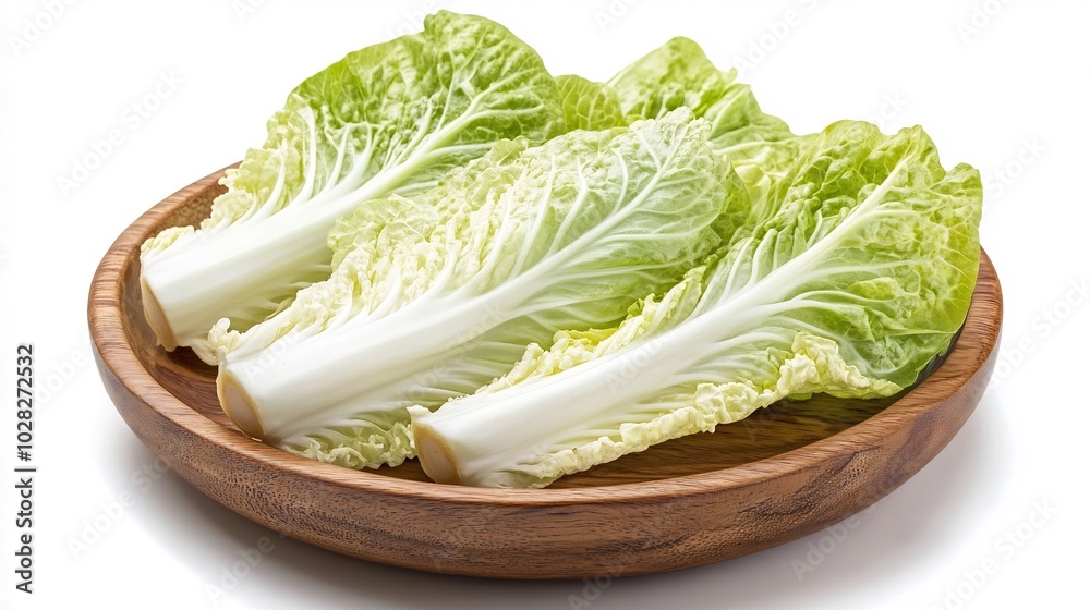 Fresh Napa Cabbage Leaves in Wooden Bowl Fresh Napa Cabbage Leaves in Wooden Bowl