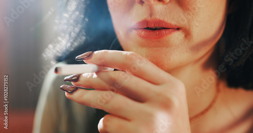 Fotografie Smoking, closeup and hands of woman with cigarette for nicotine, tobacco and addiction in home