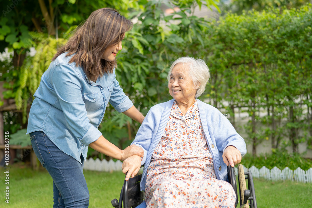 Φωτογραφία Caregiver help and care Asian senior woman patient sitting on wheelchair at nursing hospital ward, healthy strong medical