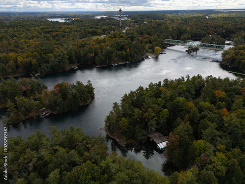 Wallpaper Mural Tranquil aerial view of the 1000 Islands region, showcasing scattered islands on serene waters under a vast sky, capturing natural beauty and peacefulness."
 Torontodigital.ca