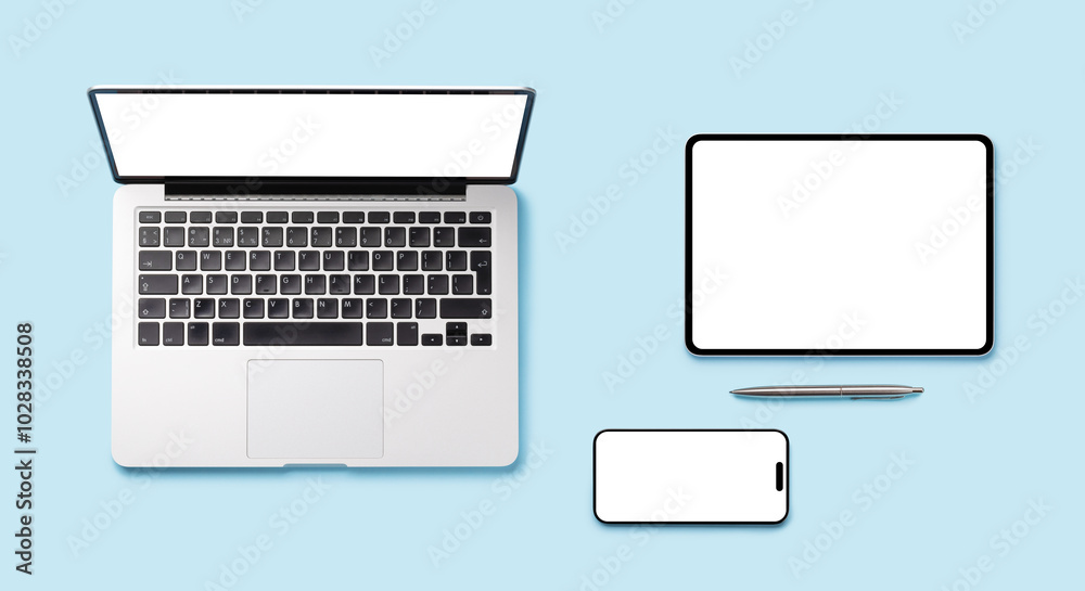 Laptop, tablet, and smartphone with blank screens arranged on a blue background Laptop, tablet, and smartphone with blank screens arranged on a blue background