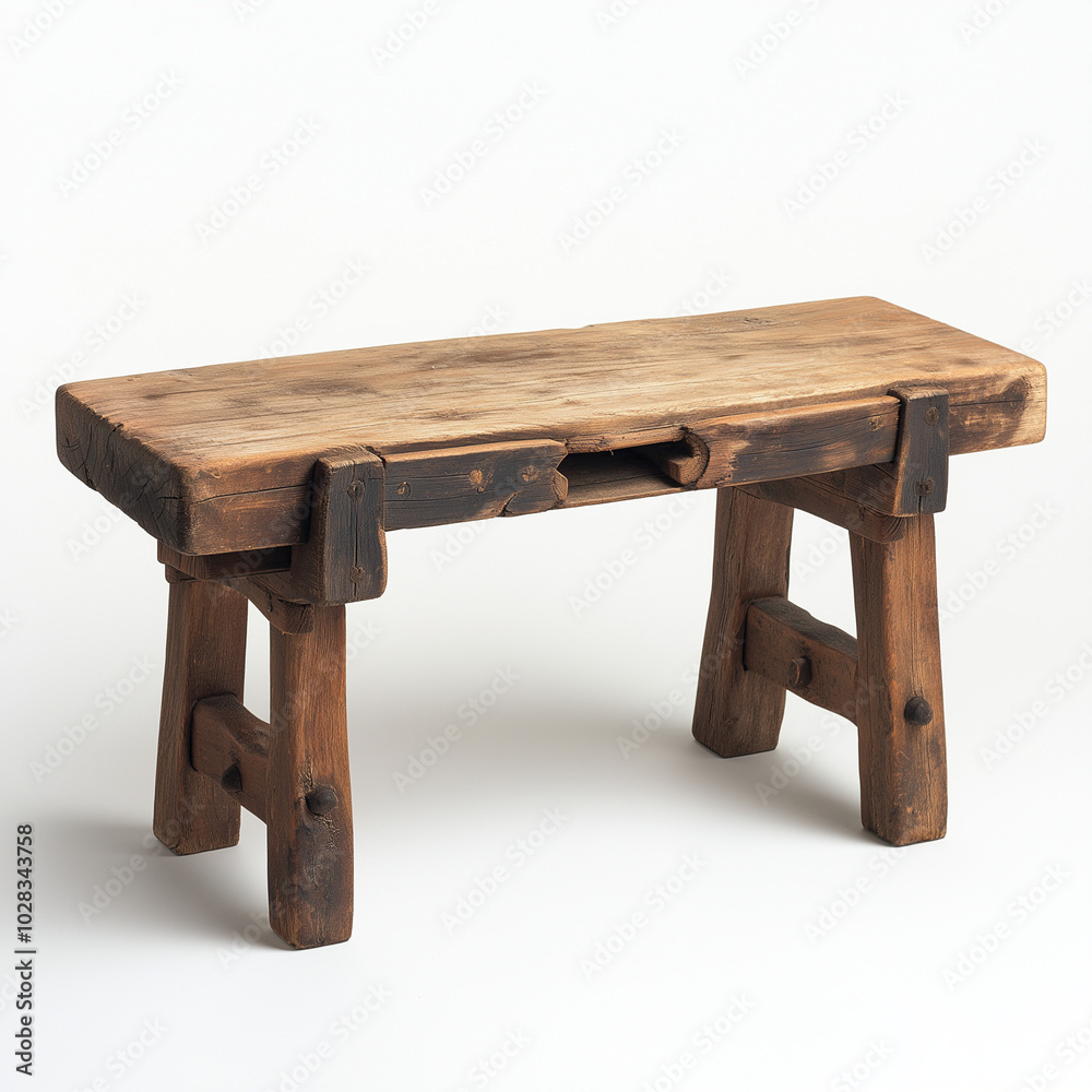 A thick, sturdy wooden workbench with rough edges A thick, sturdy wooden workbench with rough edges