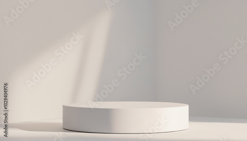 Simple white cylinder platform on a light background with a shadow. Premium photo mockup for product photography purposes.