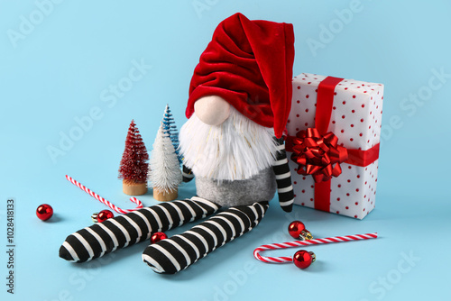 Christmas gnome with gift b...