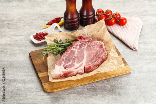 Raw pork neck steak uncoocked photo