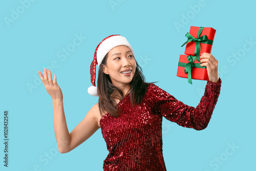 Smiling asian woman in sant...