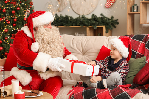 Santa claus giving christma...