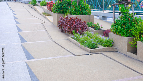 Billede på lærred Exposed aggregate finish cobblestone floor of elevated walkway on the bridge wit