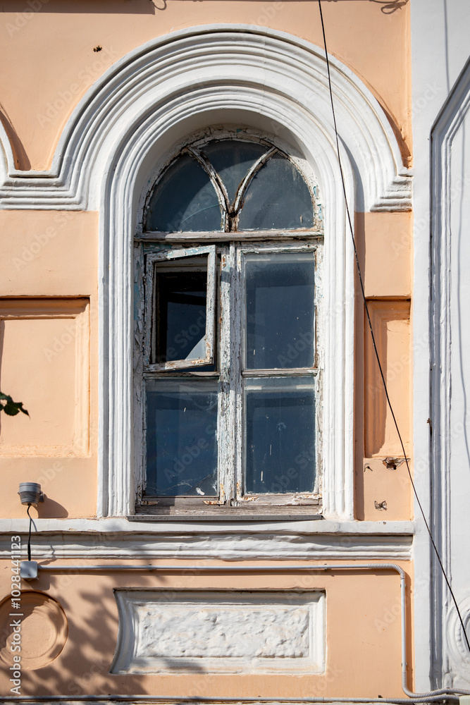 A window with a blue frame and a white frame A window with a blue frame and a white frame