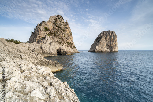 Faraglioni rocks near the coast of Capri, Italy