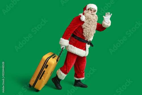 Santa Claus with suitcase w...