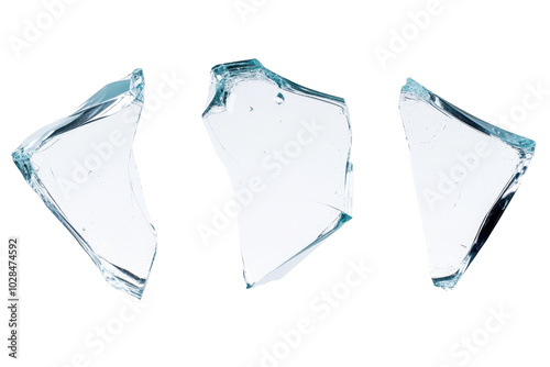 Three pieces of broken glass are shown in a white background. The glass is shattered and scattered, creating a sense of chaos and destruction. The image evokes a feeling of fragility and vulnerability