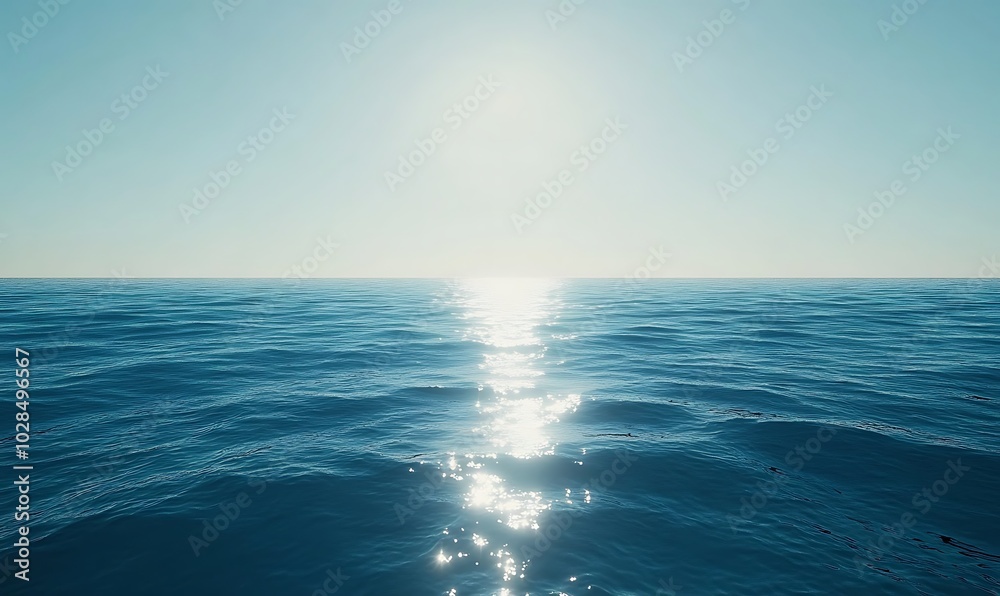A blue ocean with sunlight shining through the water surface A blue ocean with sunlight shining through the water surface