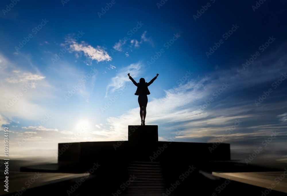 A woman in a business suit stands on a platform with her arms raised in victory. The sun shines brightly, casting a warm glow. A woman in a business suit stands on a platform with her arms raised in victory. The sun shines brightly, casting a warm glow.