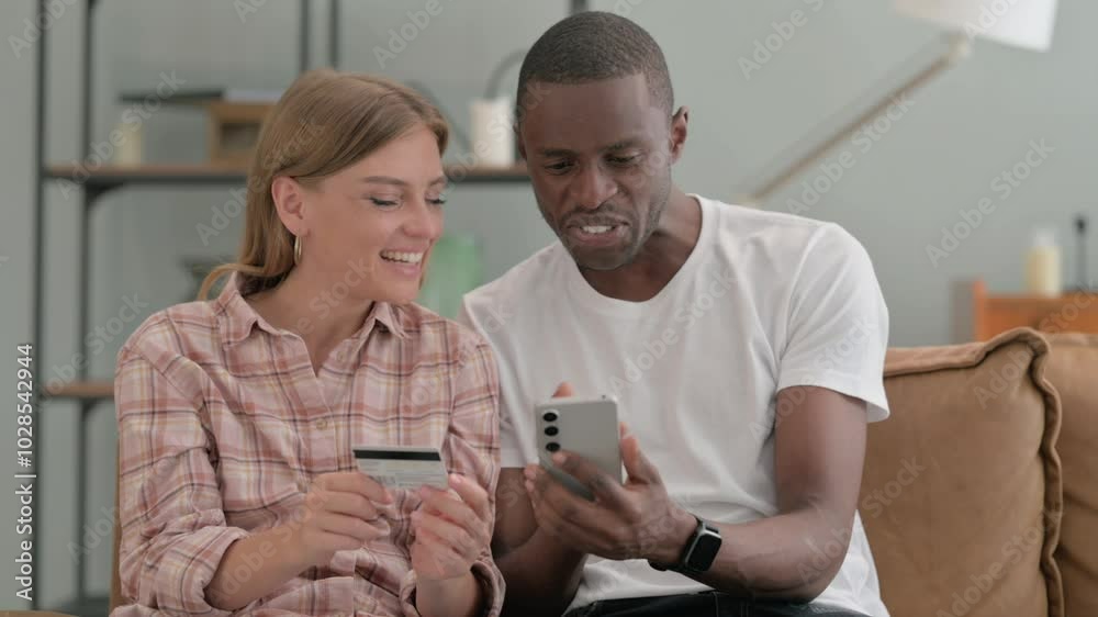Interracial Couple Shopping Online with Phone at Home Interracial Couple Shopping Online with Phone at Home