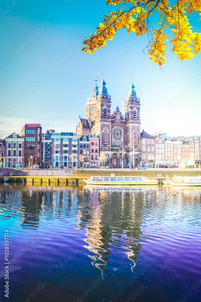 Fototapeta premium Church of St Nicholas over canal, Amsterdam, Holland