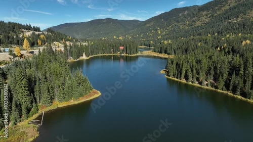 Aerial of Coquihalla Lakes surrounded by vegetation along the Coquihalla highway at fall in Canada photo