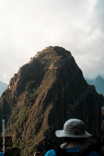 Tourists viewing Huayna Picchu at Machu Picchu, Peru. photo