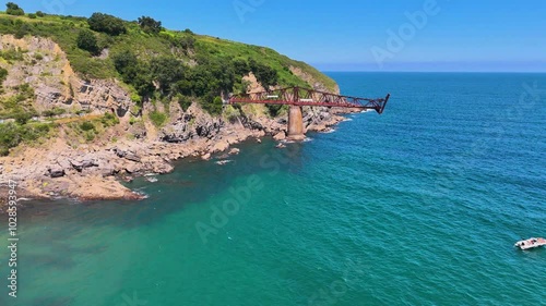 Drone footage of the Loading Dock of Dicido on a sunny day in the town of Miono, Cantabria, Spain photo