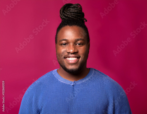 Headshot Portrait of a Smiling Man with Contemporary Style, Isolated on Color Background with Ample Copy Space