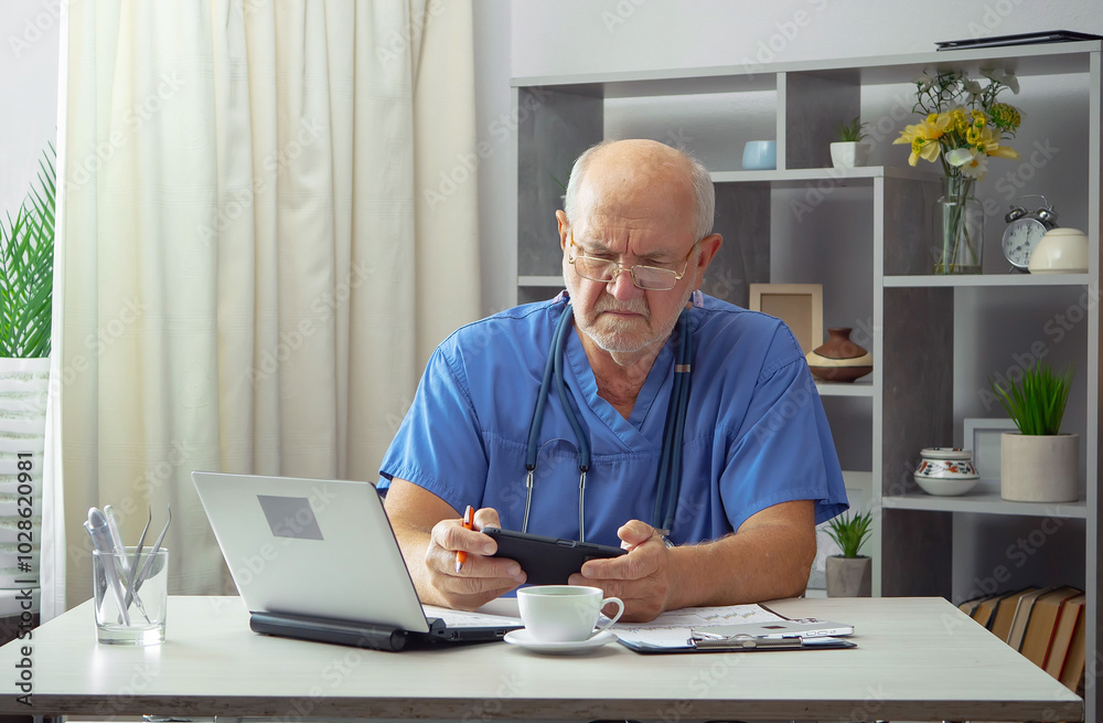 An elderly man, a doctor, in his office, at a table. An elderly man, a doctor, in his office, at a table.