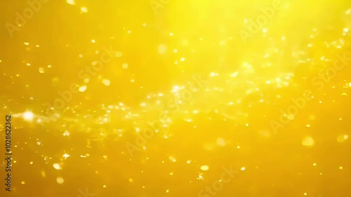 Whimsical Gold Light Play. Golden bokeh light effect with sparkling particles on a warm yellow background. Abstract festive background with glitter. 4K background material for loop playback