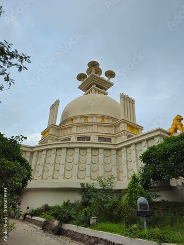 Shanti Stupa, Dhauli giri Hills, Bhubaneswar, Odisha, India. White peace pagoda & Buddhist shrine constructed atop Dhauli Hill in 1972. photo