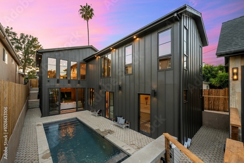 Modern home with a pool at sunset. Southern California