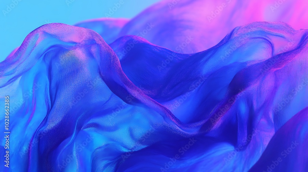 Fototapeta premium Abstract blue and pink fabric with flowing waves and soft focus.