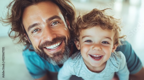 A heartfelt joyful image of a father and child laughing together, capturing familial bliss and love, symbolizing happiness and togetherness in a casual home environment.