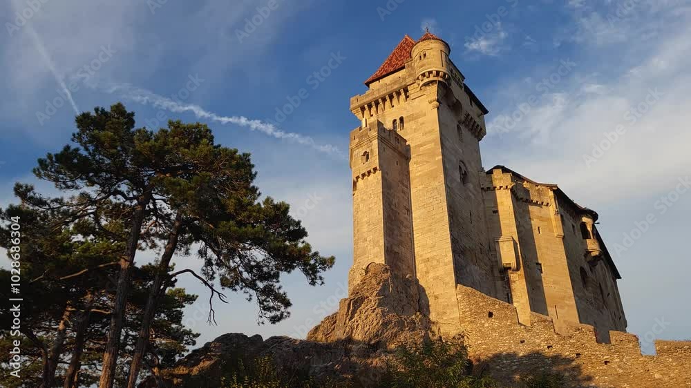 Medieval castle on a hill in an autumn forest. High quality 4k footage. Medieval castle on a hill in an autumn forest. High quality 4k footage.
